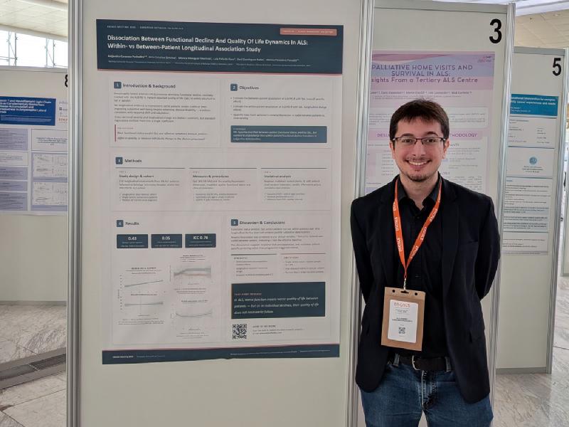 Alejandro Caravaca Puchades beside his quality-of-life poster at the ENCALS Meeting 2026